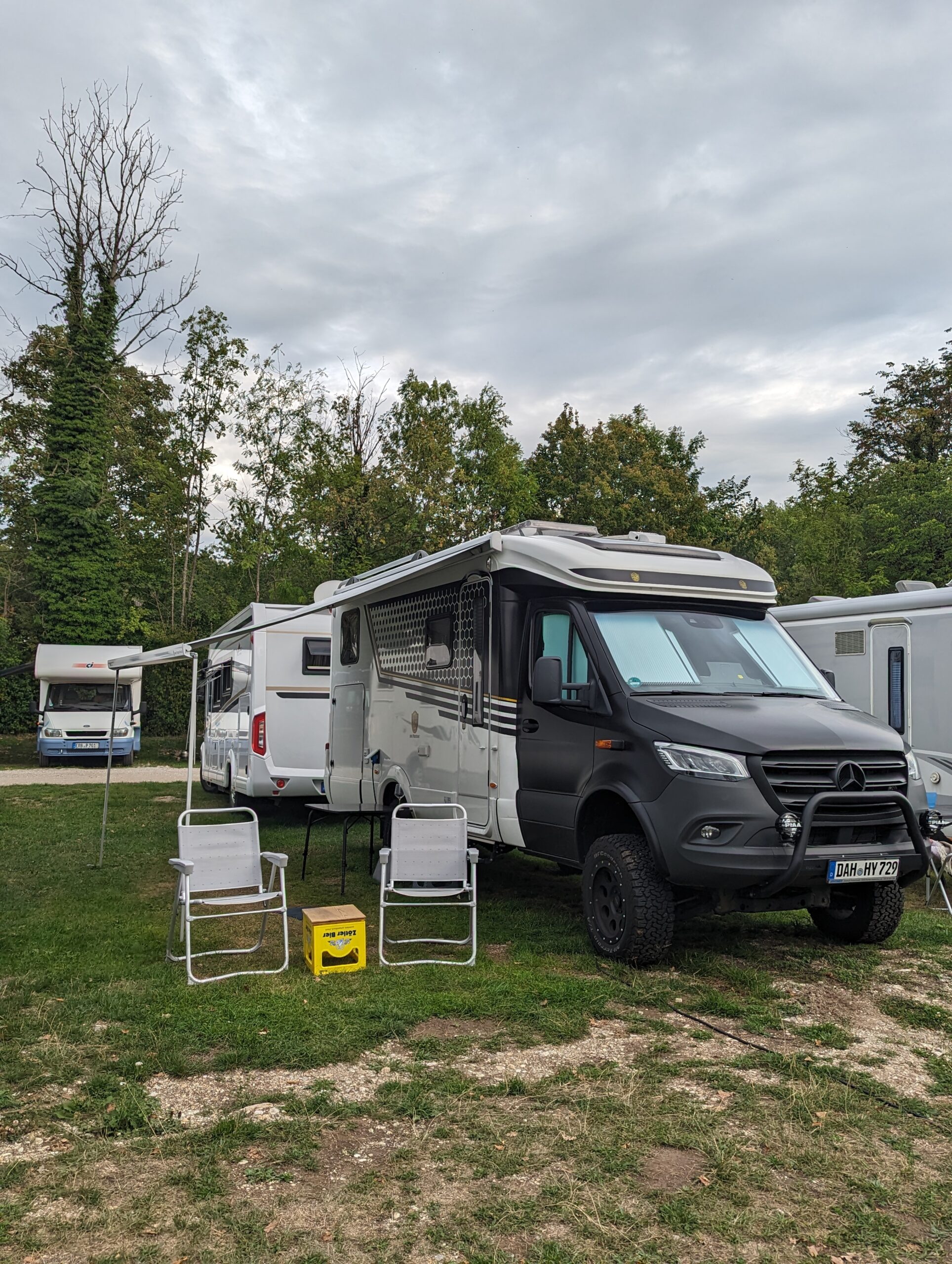 Campsite life — awning out, coffee on