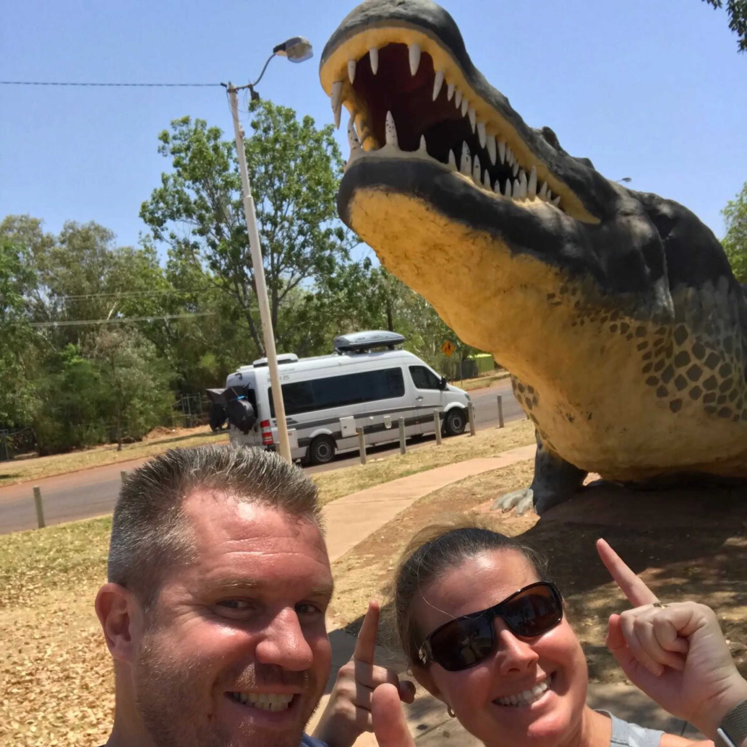 Tim and Jody with croc statue, NT